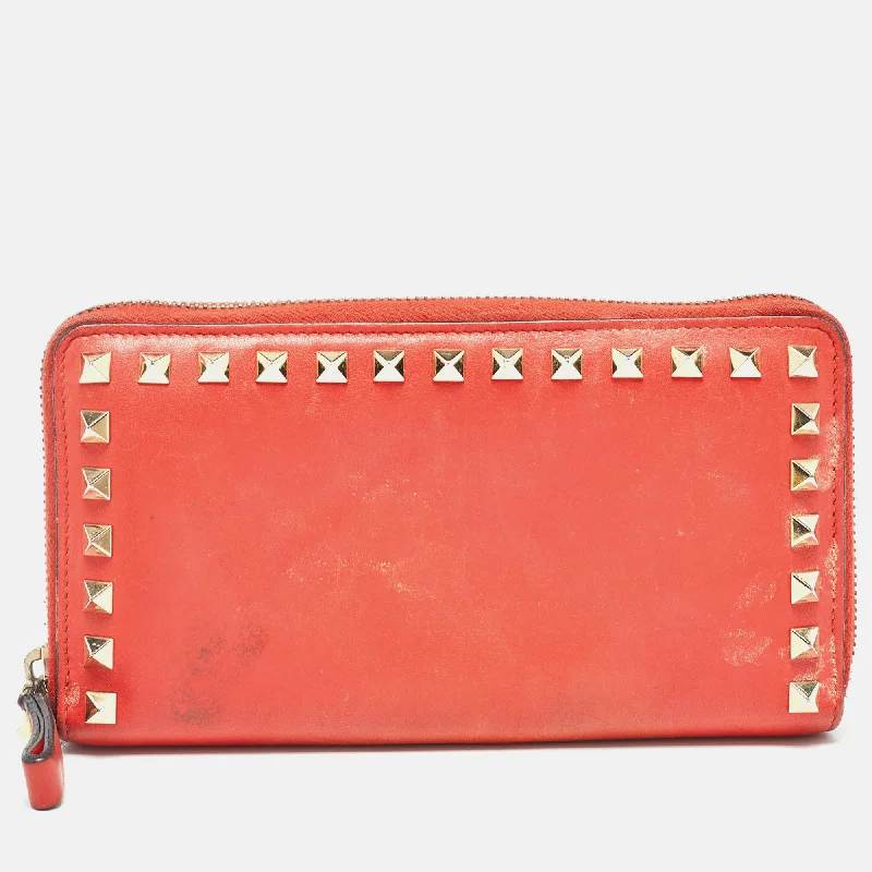 Women's money clip with a mirror on the back​Valentino Red Leather Rockstud Zip Around Continental Wallet