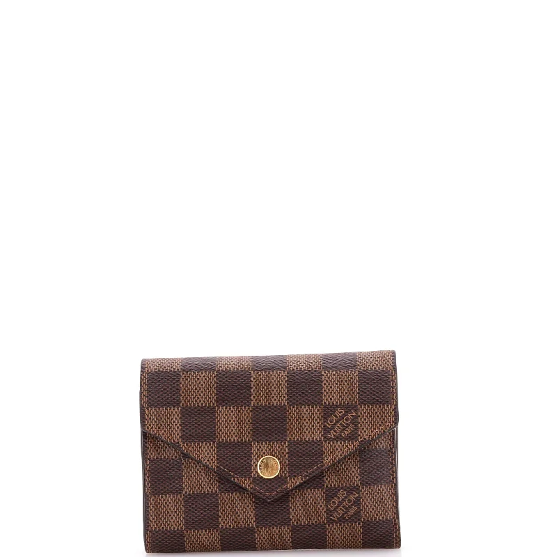 Women's money clip with a detachable charm​Victorine Wallet Damier