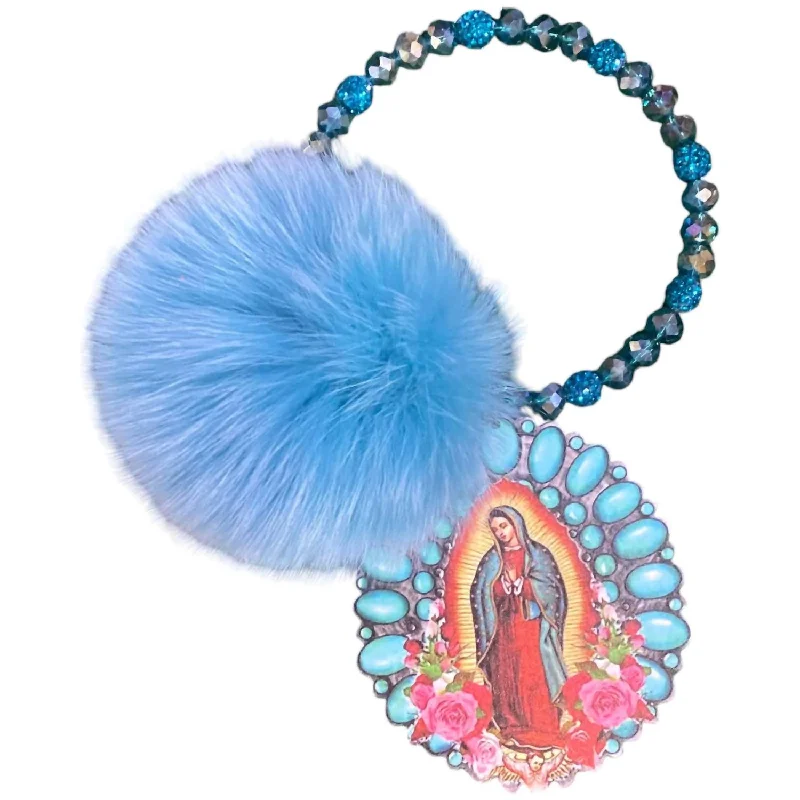 Soft - touch women's money clip for a comfortable grip​Women's Beaded Pom Pom Keychain With Guadalupe Charm In Turquoise
