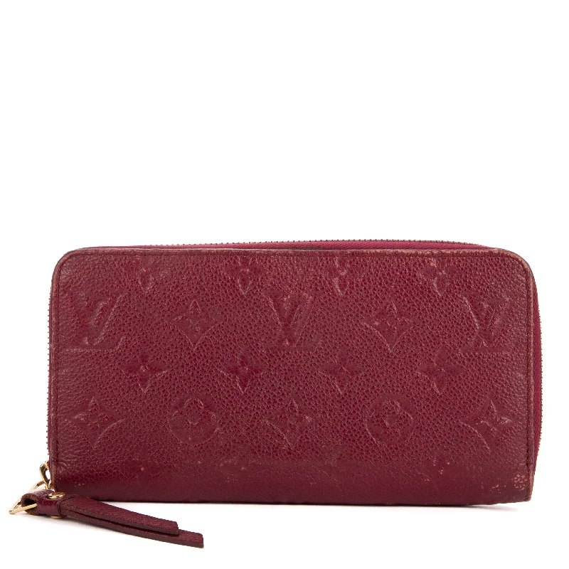 Women's money clip with a mirror on the back​Zippy Wallet