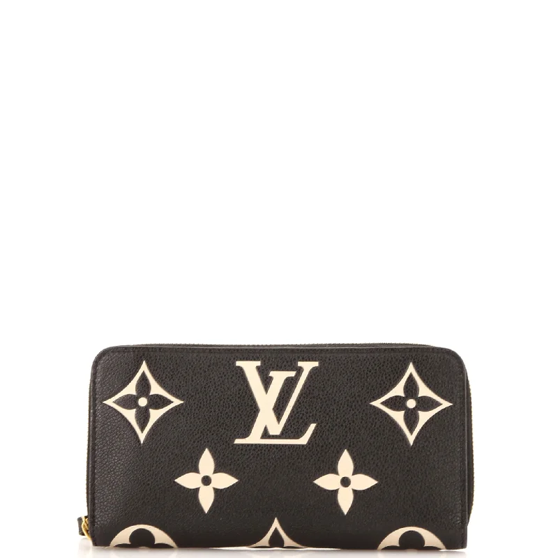 Compact women's money clip for small purses​Zippy Wallet Bicolor Monogram Empreinte Giant