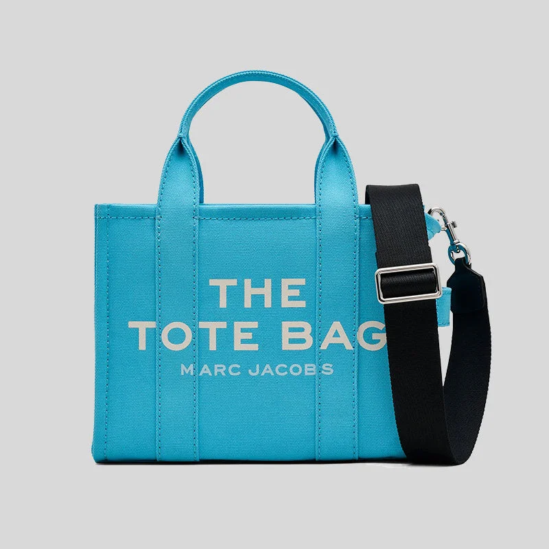 Women's Tote Bag with Magnetic Closure in Orange for Easy Access on the GoMARC JACOBS Small The Tote Bag Aqua M0016493 Women's Tote Bag with Magnetic Closure in Orange for Easy Access on the GoMARC JACOBS Small The Tote Bag Aqua M0016493