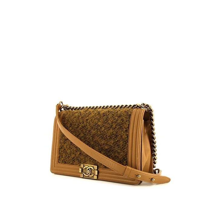 Canvas and Leather Combo Shoulder Bag in Tan for a Rustic LookChanel Boy large model shoulder bag in brown whool and brown leather Canvas and Leather Combo Shoulder Bag in Tan for a Rustic LookChanel Boy large model shoulder bag in brown whool and brown leather