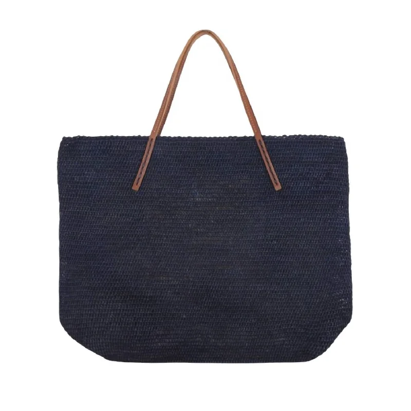 Canvas and Leather Combo Shoulder Bag in Tan for a Rustic LookLarge Baby Classic Tight Mesh Raffia Basket Bag In Nuit