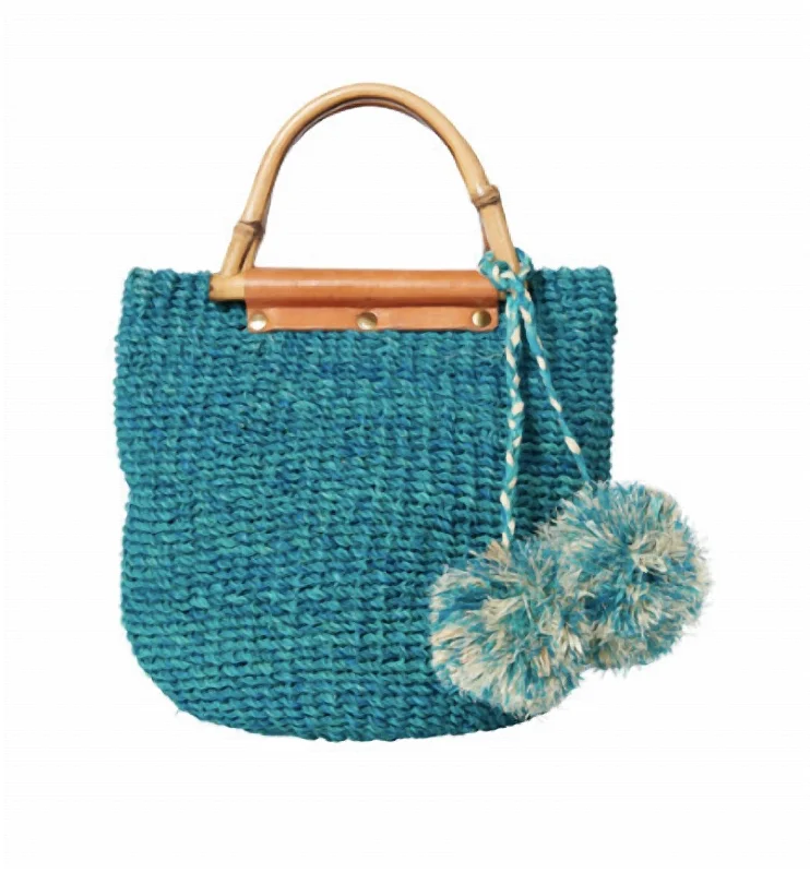 Printed Silk Shoulder Bag in Red for a Pop of ColorMaxi Poof Handbag In Turquoise