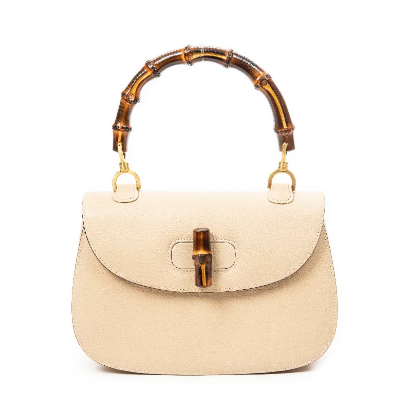 Quilted Shoulder Bag in Cream for a Classic and Elegant LookMedium Bamboo Top Handle Quilted Shoulder Bag in Cream for a Classic and Elegant LookMedium Bamboo Top Handle