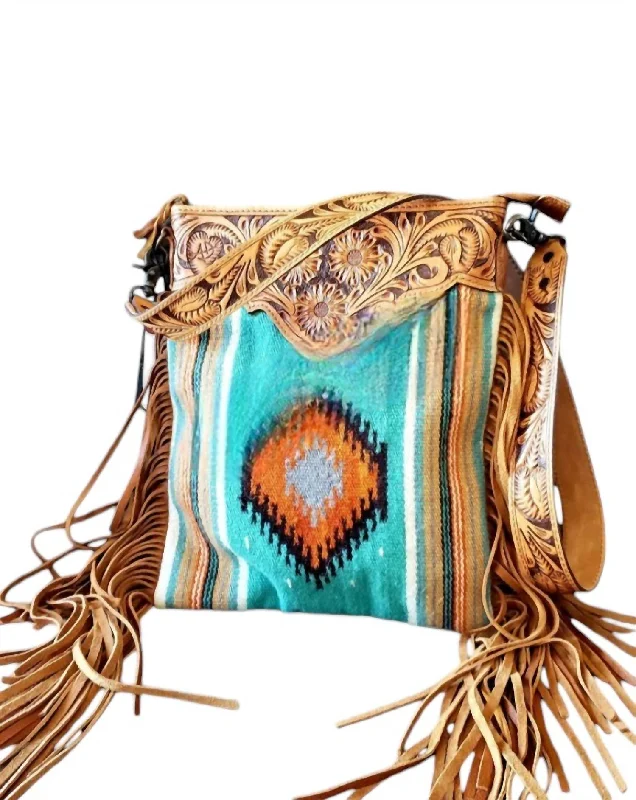 Canvas and Leather Combo Shoulder Bag in Tan for a Rustic LookWomen's Sunset Blanket Bag In Serape Saddle Canvas and Leather Combo Shoulder Bag in Tan for a Rustic LookWomen's Sunset Blanket Bag In Serape Saddle