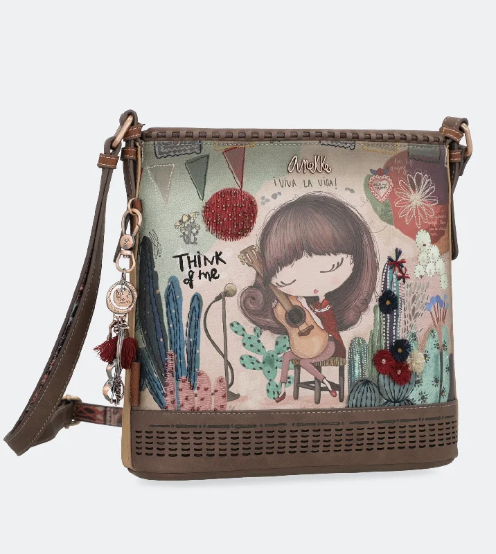 Leather - Trimmed Denim Crossbody Bag in Blue for a Vintage - Inspired LookIxchel Crossbody bag with a zip Leather - Trimmed Denim Crossbody Bag in Blue for a Vintage - Inspired LookIxchel Crossbody bag with a zip