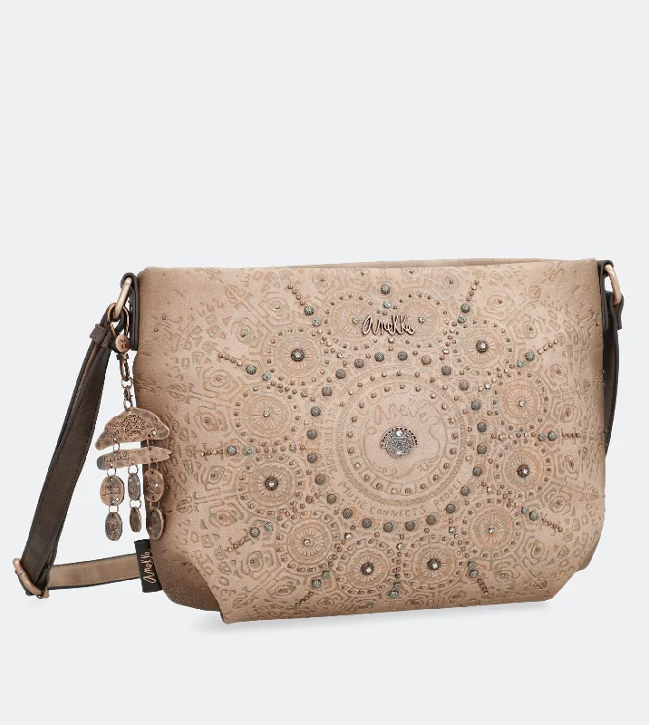 Metallic Crossbody Bag in Silver for New Year's Eve and Special CelebrationsIxchel Walking crossbody bag Metallic Crossbody Bag in Silver for New Year's Eve and Special CelebrationsIxchel Walking crossbody bag