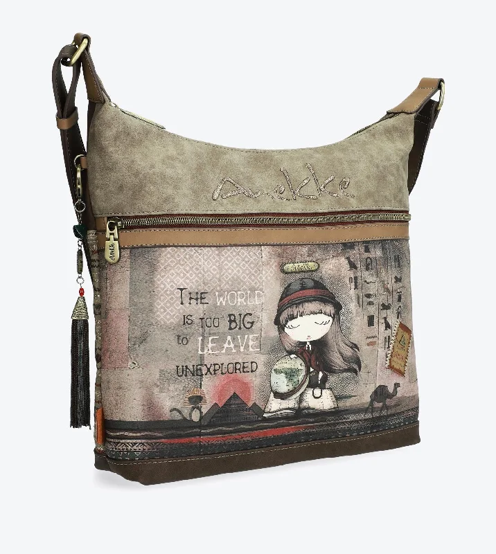 Leather - Trimmed Denim Crossbody Bag in Blue for a Vintage - Inspired LookPrinted crossbody bag in earthy tones Leather - Trimmed Denim Crossbody Bag in Blue for a Vintage - Inspired LookPrinted crossbody bag in earthy tones