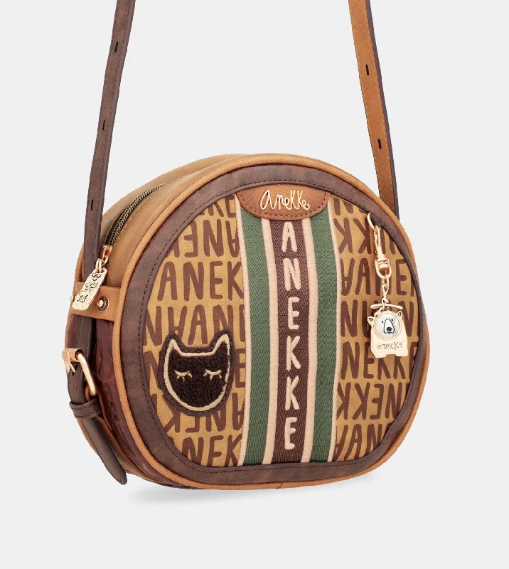 Large Faux Leather Crossbody Bag in Brown with Tassel Details for Casual TravelRound shoulder bag with Urban logo