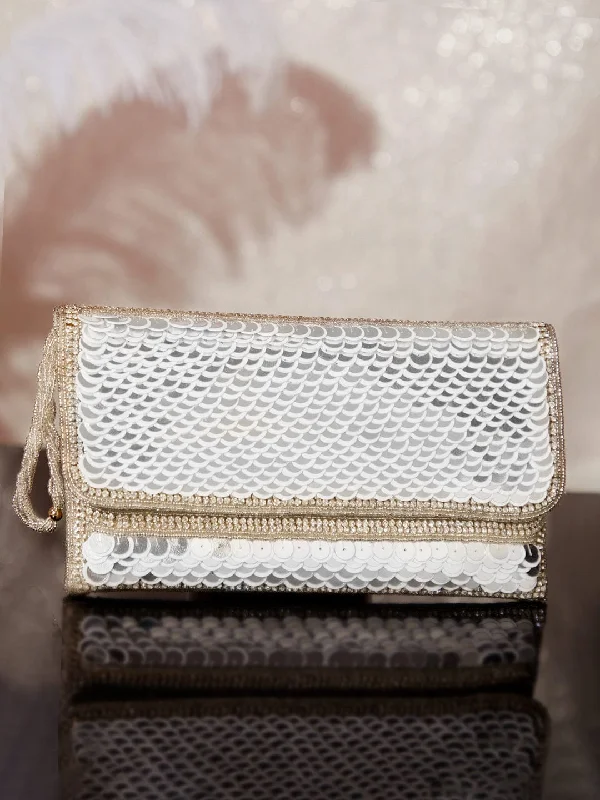 Bejeweled Clutch in Purple for Opera PerformancesRubans Silver Colour Clutch With Embroided Silver Design.